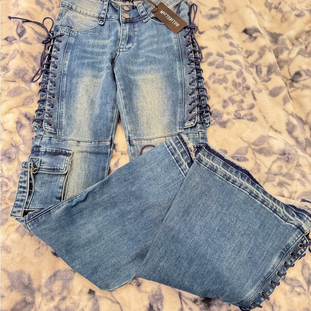 dELiA*s for 🌸Dolls Kill 🌸 
Blue Flare Jeans with Lace-Up Detail